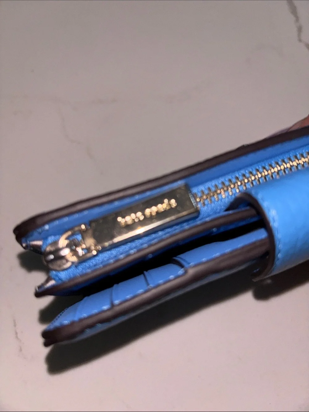 kate spade pebble leather zip wallet in bright blue